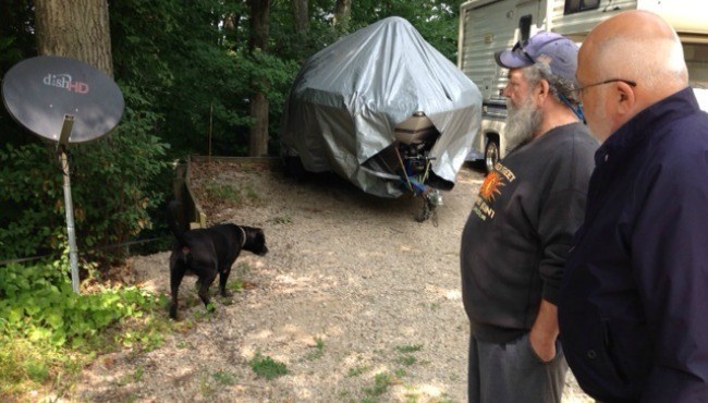 Jeffrey Kopp And His Black Lab, Bobby Found The Hours-Old Newborn Girl Beneath This Satellite Dish During Their Morning Walk. Photo Via Woodtv.
