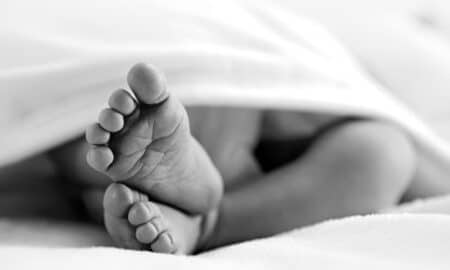 Newborn Feet In Black And White