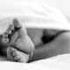Newborn Feet In Black And White
